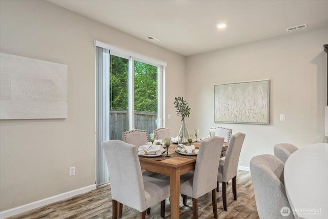 12304 55th Dr SE, Snohomish, WA 98296 - dining room with wood finished floors, baseboards, and recessed lighting