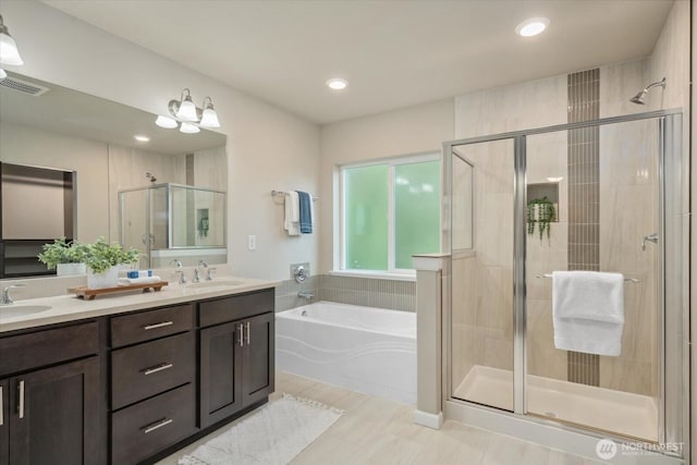 12304 55th Dr SE, Snohomish, WA 98296 - bathroom with a garden tub, a shower stall, double vanity, and recessed lighting