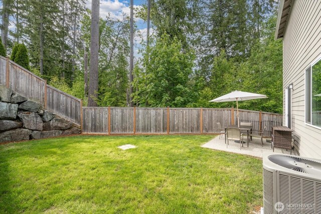 12304 55th Dr SE, Snohomish, WA 98296 - view of yard with central AC and a patio
