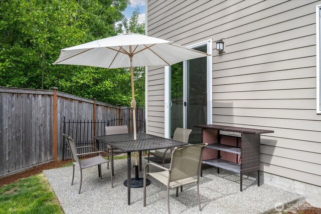 12304 55th Dr SE, Snohomish, WA 98296 - fenced backyard featuring outdoor dining area and a patio area