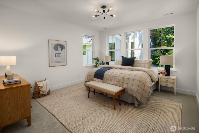 12833 NE 91st St, Kirkland, WA 98033 - bedroom featuring a chandelier, baseboards, and carpet flooring