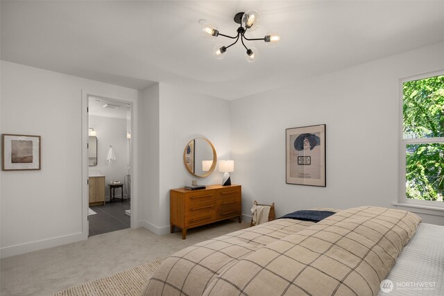 12833 NE 91st St, Kirkland, WA 98033 - bedroom featuring a chandelier, carpet floors, baseboards, and ensuite bathroom