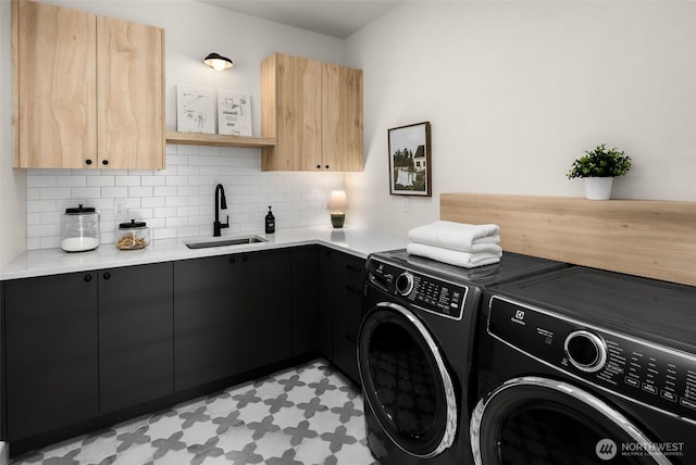 12833 NE 91st St, Kirkland, WA 98033 - washroom featuring washing machine and dryer, cabinet space, and light floors