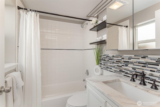 7408 S 128th St, Seattle, WA 98178 - bathroom with toilet, vanity, shower / bath combo, and backsplash