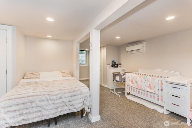207 N Colville St, Walla Walla, WA 99362 - carpeted bedroom with a wall unit AC, recessed lighting, and baseboards