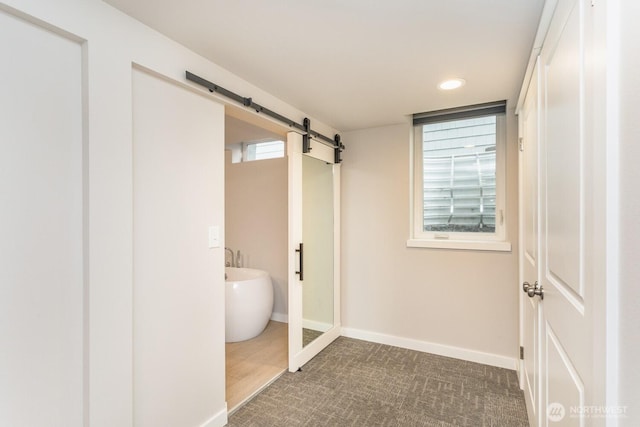 207 N Colville St, Walla Walla, WA 99362 - bathroom featuring baseboards, recessed lighting, and a soaking tub
