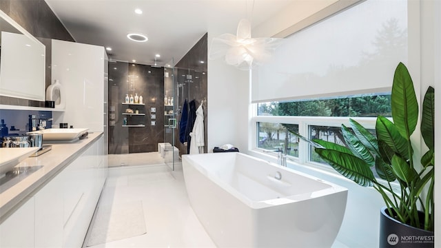 903 N 33rd Pl, Renton, WA 98056 - full bathroom with a stall shower, a freestanding tub, double vanity, and recessed lighting