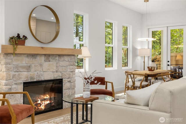 12837 NE 91st St, Kirkland, WA 98033 - living area with a fireplace and wood finished floors