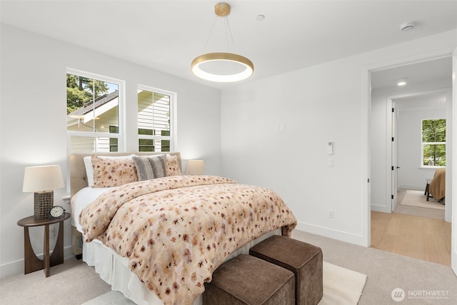 12837 NE 91st St, Kirkland, WA 98033 - bedroom with light carpet and baseboards