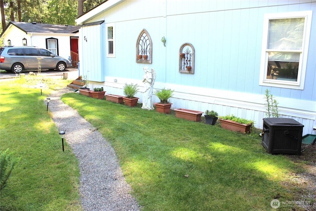 17340 Sargent Rd SW Unit 54, Rochester, WA 98579 - view of side of property featuring a yard