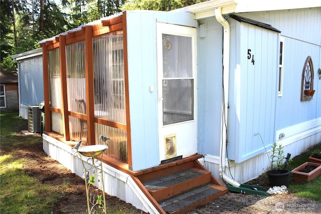 17340 Sargent Rd SW Unit 54, Rochester, WA 98579 - exterior view of entry steps and central AC