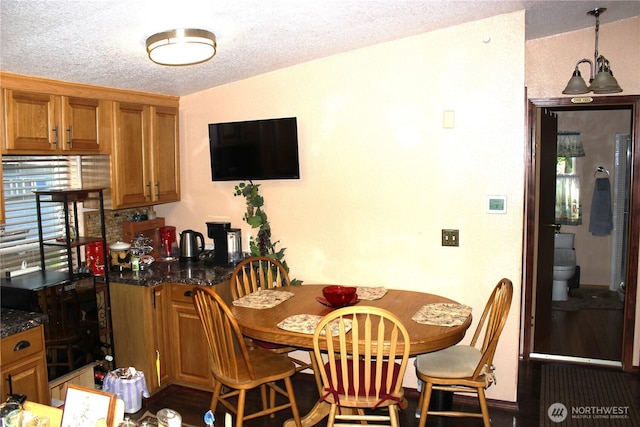 17340 Sargent Rd SW Unit 54, Rochester, WA 98579 - dining area with a textured ceiling