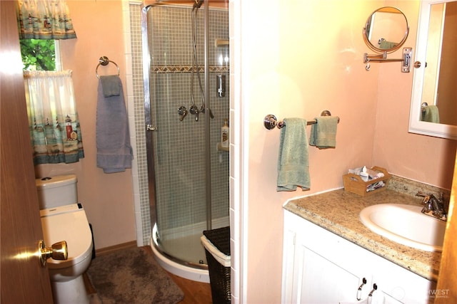 17340 Sargent Rd SW Unit 54, Rochester, WA 98579 - bathroom with toilet, a shower stall, and vanity