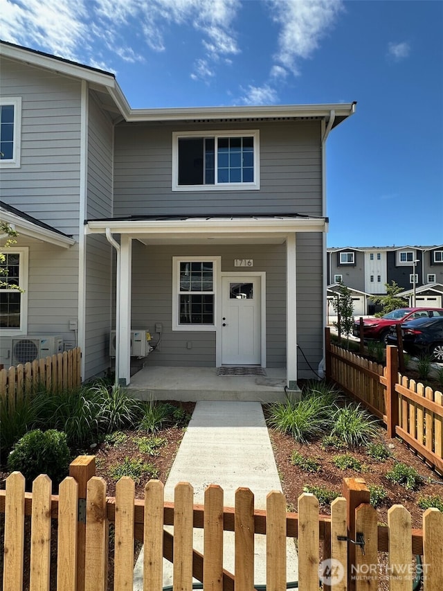 1716 Sunup Loop, Bellingham, WA 98226 - traditional-style home featuring a fenced front yard and a porch