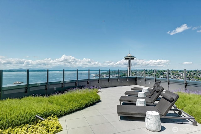 2510 6th Ave Unit 2003, Seattle, WA 98121 - view of patio / terrace with a water view and a balcony