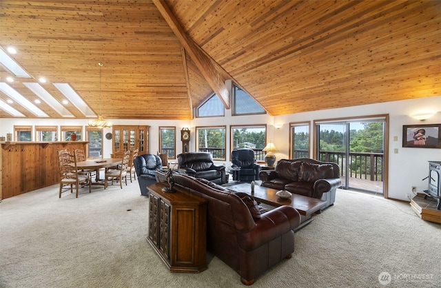 280 Surf St, Westport, WA 98595 - living area with light carpet, high vaulted ceiling, wooden ceiling, a chandelier, and recessed lighting