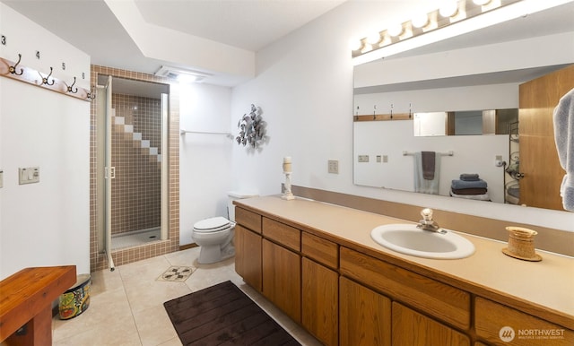 280 Surf St, Westport, WA 98595 - bathroom with vanity, a stall shower, tile patterned floors, and toilet