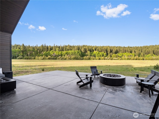 30 Symphony Ct, Cle Elum, WA 98922 - view of patio / terrace with an outdoor fire pit and a forest view