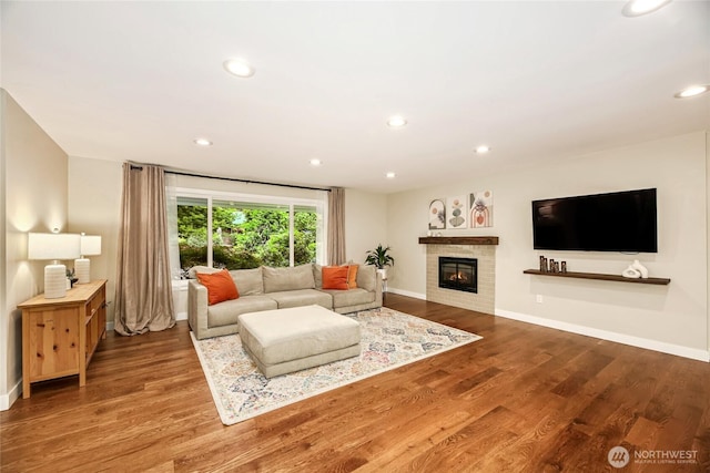 3908 NE 103rd St, Seattle, WA 98125 - living room with wood finished floors, a fireplace, and recessed lighting