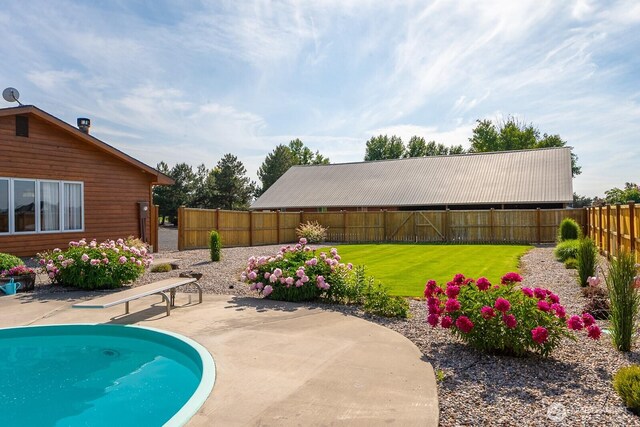 710 S Mckinney Rd, Othello, WA 99344 - view of pool with a patio area