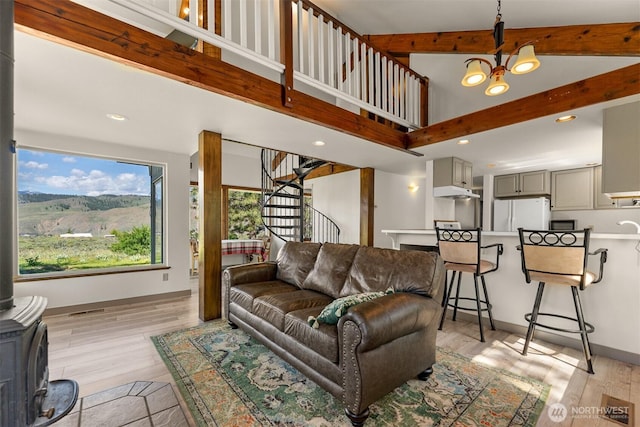 102A Vintin Rd, Carlton, WA 98814 - living area featuring a chandelier, beamed ceiling, recessed lighting, stairway, and light wood finished floors