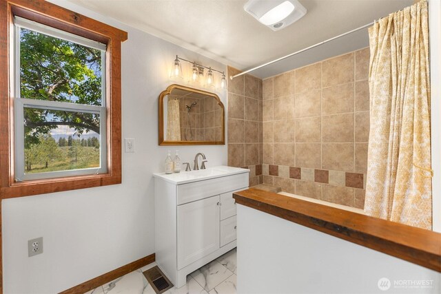 102A Vintin Rd, Carlton, WA 98814 - full bathroom featuring marble finish flooring, vanity, a shower with shower curtain, and baseboards