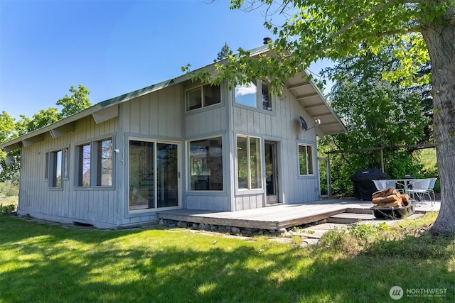 102A Vintin Rd, Carlton, WA 98814 - rear view of house featuring a deck and a yard