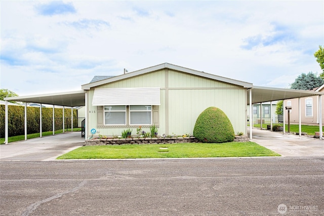 815 NE Karol Loop, College Place, WA 99324 - view of front of home with an attached carport and driveway