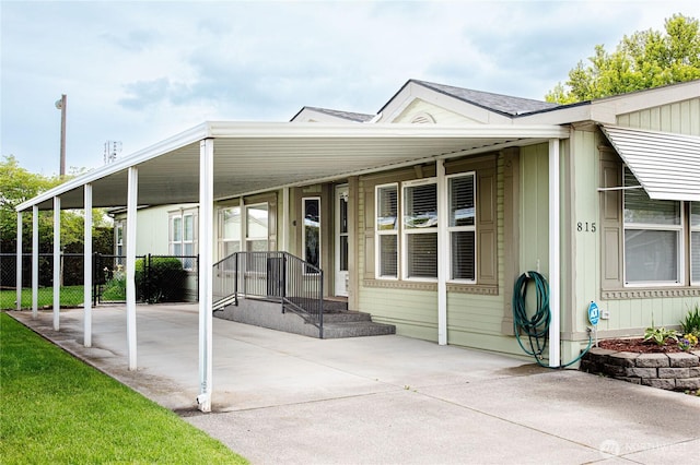 815 NE Karol Loop, College Place, WA 99324 - manufactured / mobile home featuring concrete driveway and an attached carport