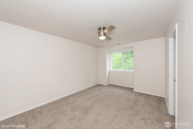 10923 63rd St E, Puyallup, WA 98372 - carpeted empty room with ceiling fan and baseboards