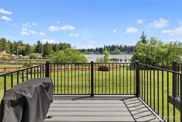 2311 Milton Way Unit E, Milton, WA 98354 - wooden deck featuring a water view, grilling area, and view of scattered trees