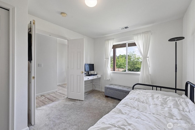 2311 Milton Way Unit E, Milton, WA 98354 - bedroom featuring carpet flooring, baseboards, and an office area