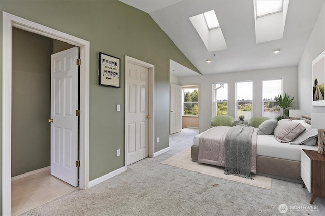 2311 Milton Way Unit E, Milton, WA 98354 - bedroom featuring a skylight, lofted ceiling, carpet, baseboards, and recessed lighting