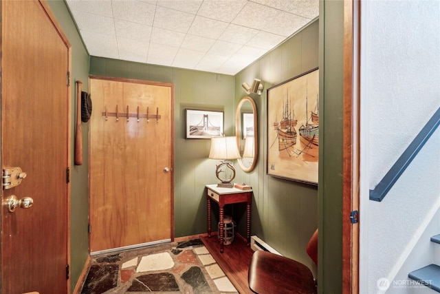 4210 N Vassault St, Tacoma, WA 98407 - entryway featuring baseboards, a baseboard heating unit, and wood finished floors
