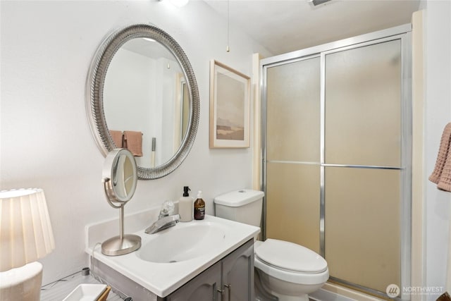 4210 N Vassault St, Tacoma, WA 98407 - bathroom featuring a stall shower, vanity, and toilet