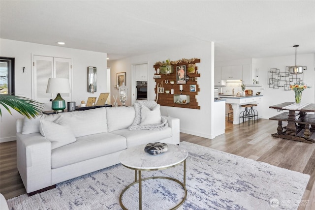 4210 N Vassault St, Tacoma, WA 98407 - living area featuring light wood-style flooring, recessed lighting, and baseboards