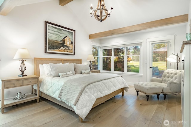5552 Canvasback Rd, Blaine, WA 98230 - bedroom featuring a chandelier, access to outside, and light wood-style flooring