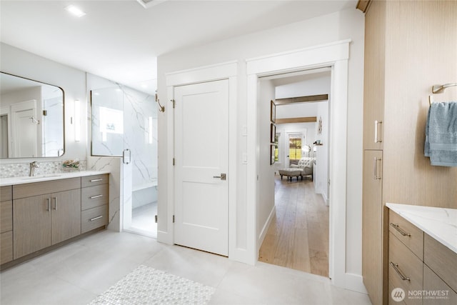 5552 Canvasback Rd, Blaine, WA 98230 - ensuite bathroom with vanity, a marble finish shower, and baseboards