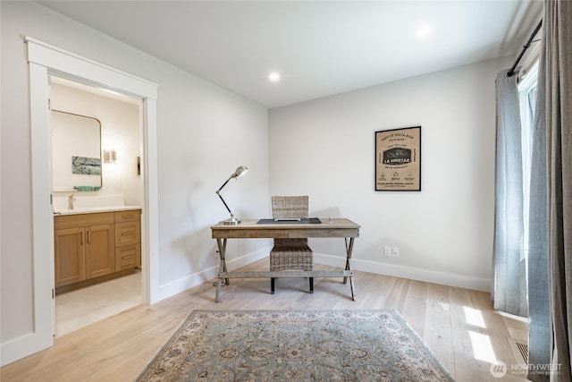 5552 Canvasback Rd, Blaine, WA 98230 - office space featuring light wood-type flooring, baseboards, recessed lighting, and a sink
