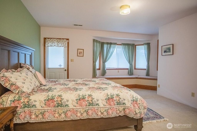 12289 Seabeck Hwy NW, Seabeck, WA 98380 - bedroom featuring multiple windows and carpet