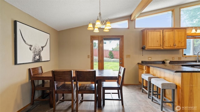810 E Spring, Dayton, WA 99328 - dining space with a chandelier, baseboards, and light tile patterned floors