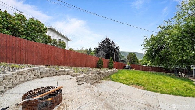 810 E Spring, Dayton, WA 99328 - view of patio featuring a fire pit