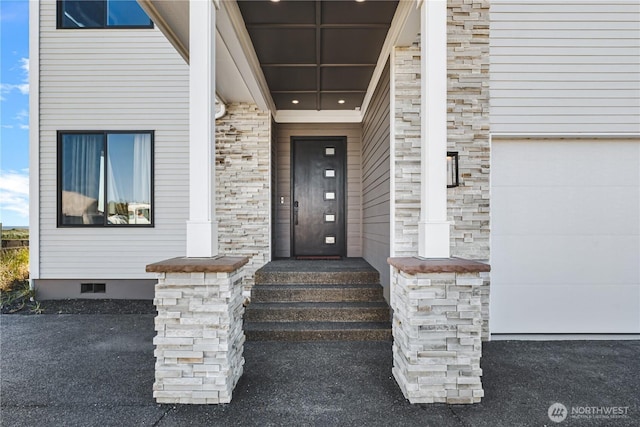 1401 S Cohasset Crst, Westport, WA 98595 - view of exterior entry featuring stone siding and crawl space