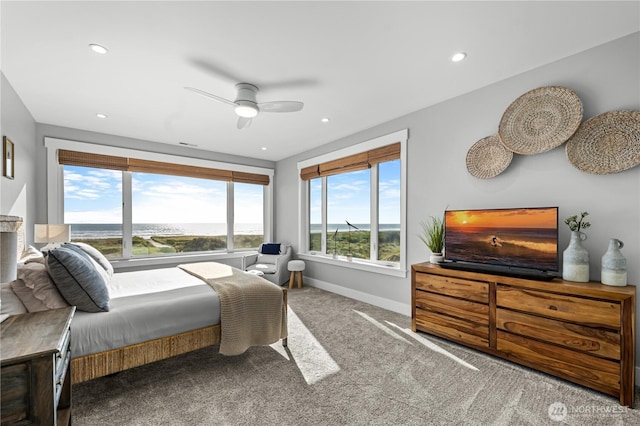 1401 S Cohasset Crst, Westport, WA 98595 - carpeted bedroom with baseboards, recessed lighting, and a ceiling fan