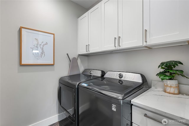 1401 S Cohasset Crst, Westport, WA 98595 - laundry room featuring cabinet space, washer and dryer, and baseboards
