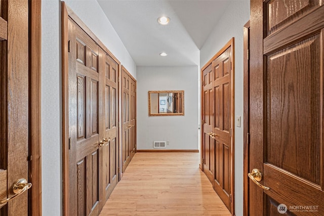 9138 Edgewater Dr SW, Lakewood, WA 98499 - hall featuring light wood finished floors, recessed lighting, and baseboards