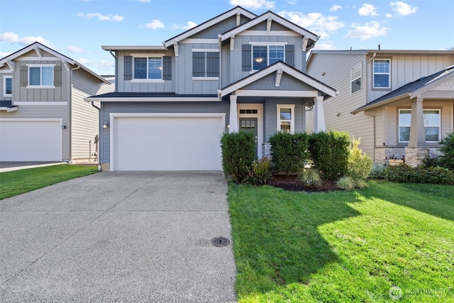 6245 N 86th Ave, Camas, WA 98607 - craftsman-style home with board and batten siding, concrete driveway, a garage, and a front yard