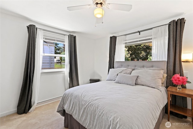 4325 E B St, Tacoma, WA 98404 - bedroom with multiple windows, light carpet, baseboards, and ceiling fan