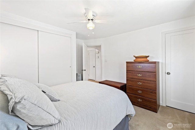 4325 E B St, Tacoma, WA 98404 - bedroom featuring light colored carpet, a closet, and a ceiling fan