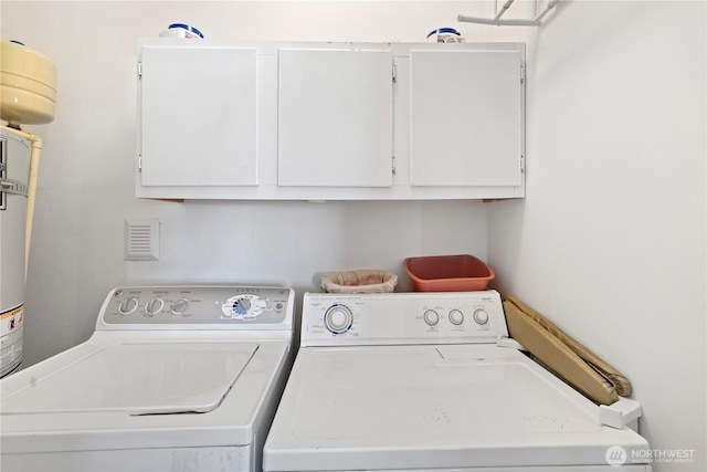 4325 E B St, Tacoma, WA 98404 - laundry area with cabinet space and washer and dryer